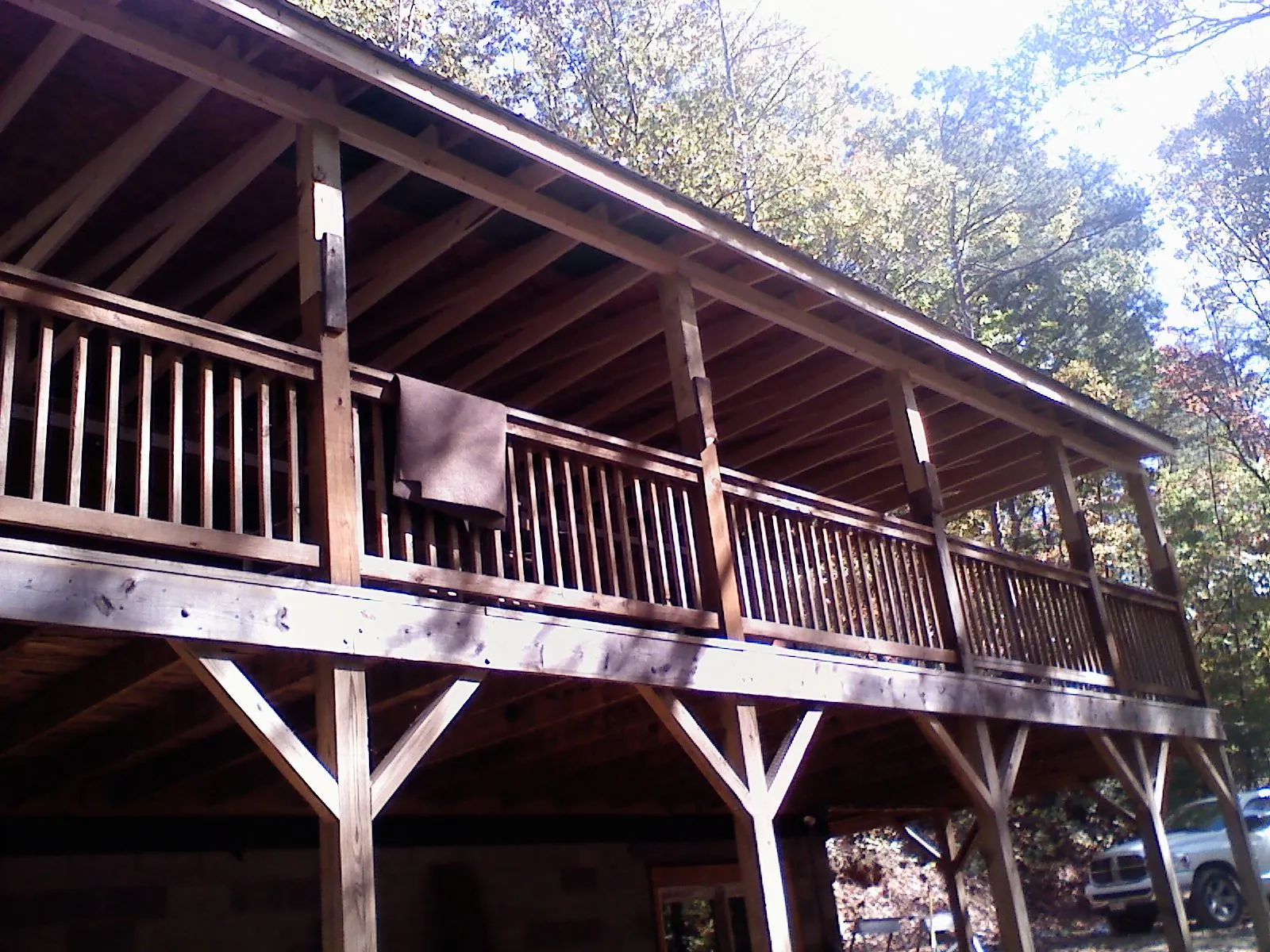 Timber framing under a new elevated porch and deck — Roof Leak Repair in Searcy by Roofing Brothers